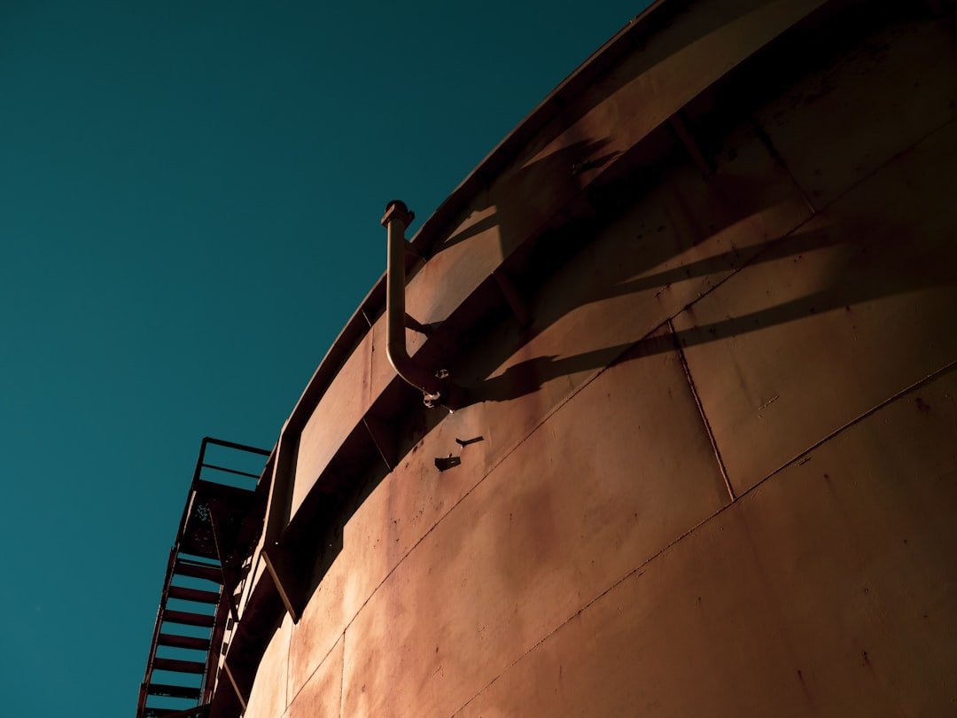 Close-up of an industrial gas tank fitting, relevant to SCDF tank certification requirements for dangerous goods vehicles in Singapore