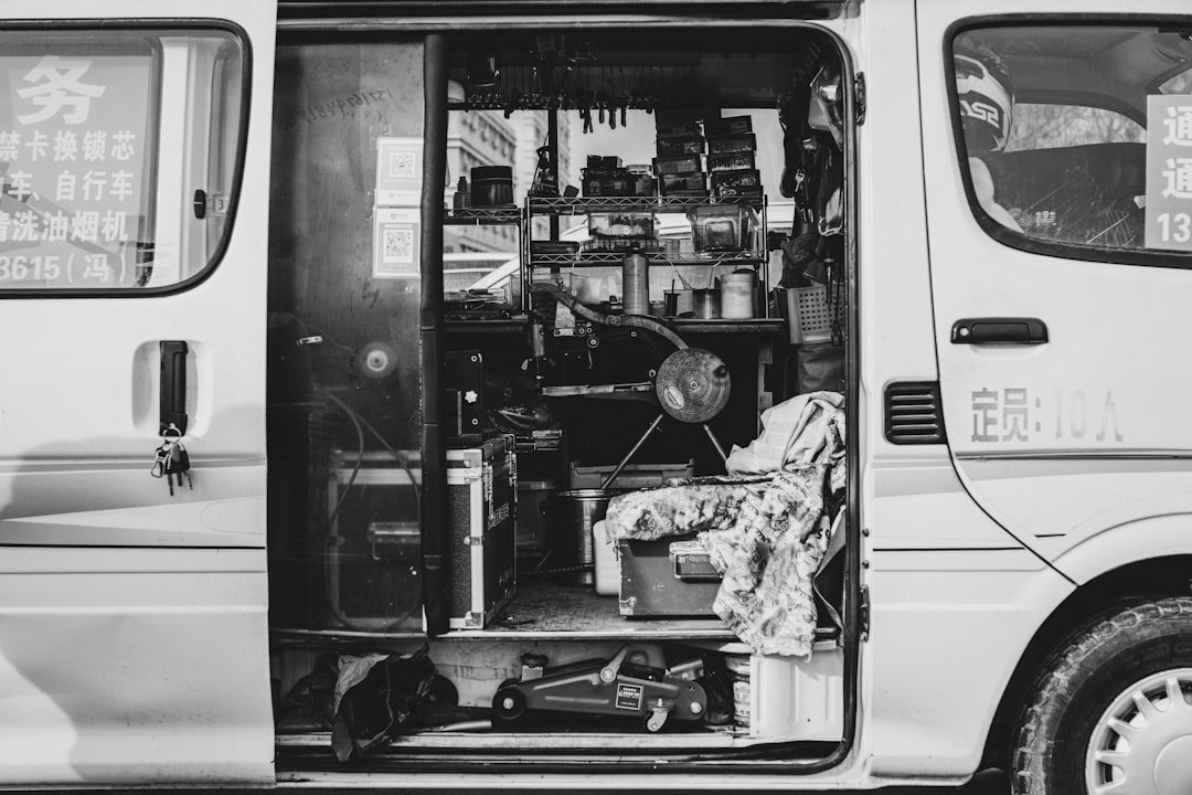 Van interior converted into a mobile workshop, illustrating commercial vehicle maintenance and inspection equipment